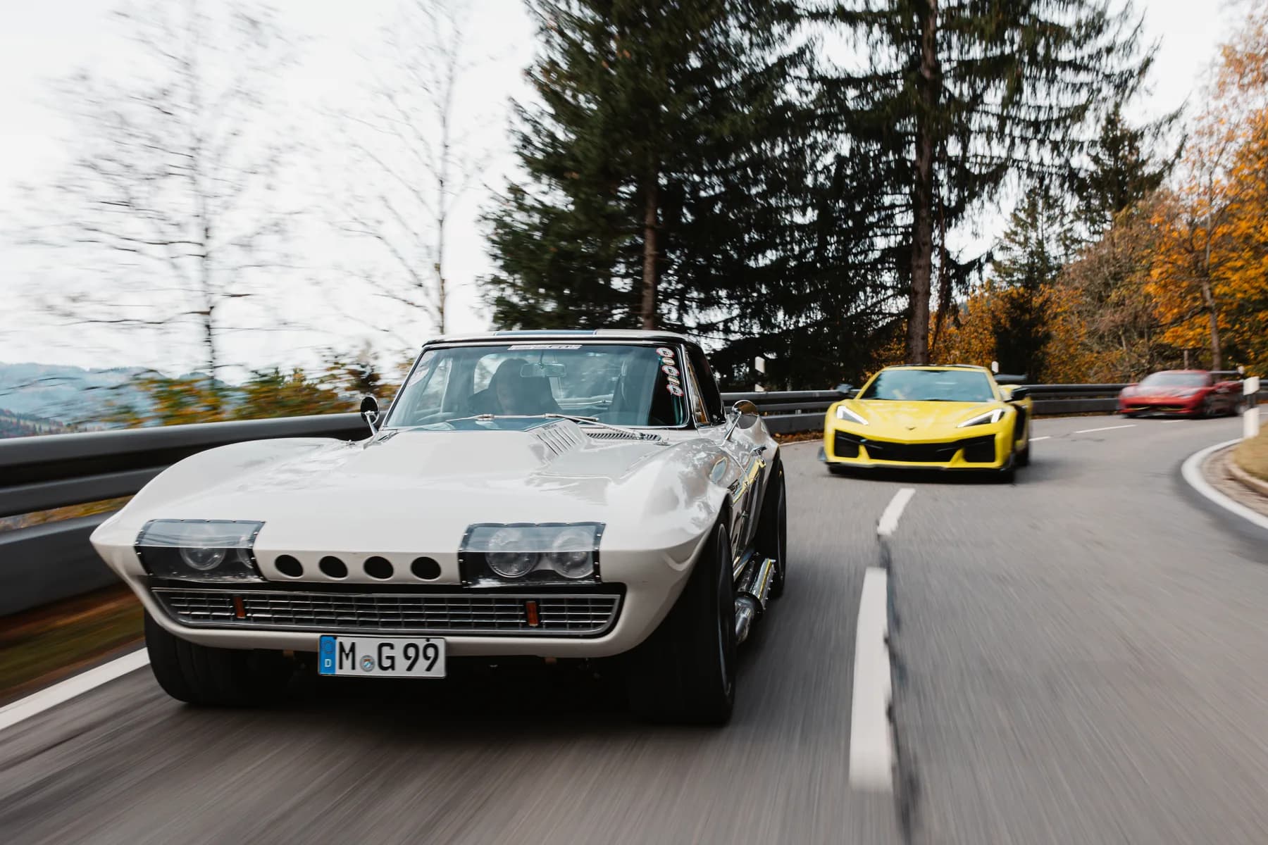 Classic Corvette C2 and Corvette Z06 at the Jochpass Memorial hill climb